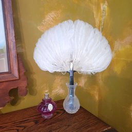 French Perfume, Feather Fan And Glass Vase (Downstairs Bedroom)