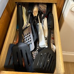 Drawer Full Of Various Size Spatulas (kitchen)