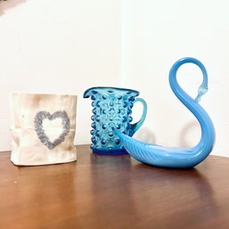 Trio Of Decorative Glass And Ceramic Decor: Art Glass Blue Swan, Blue Hobnail Mini Pitcher, Ceramic 'bag' (clo