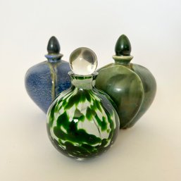 Two Ceramic And One Glass Bottle With Stoppers (dining Room)