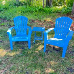 Plastic Adirondack Chairs And Table (outside)