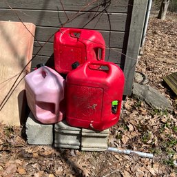 Assorted Plastic Gas Cans (shed)