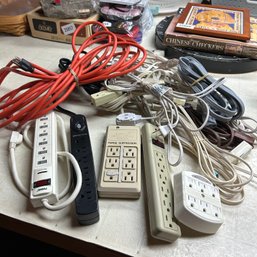 Large Lot Of Power Supplies And Extension Cords (Basement Table)