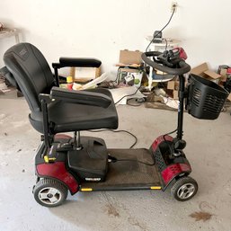 Pride Go-go Elite Traveler Motorized Scooter (garage)