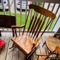 Brown Wooden Rocking Chair In Excellent Condition