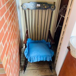 Black Rocking Chair With Blue Pillow