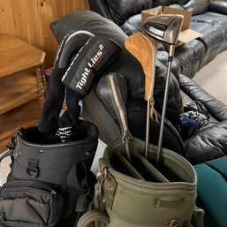 Calloway And Burton Golf Bags With Assorted Golf Clubs (basement)