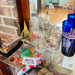 Mixed Lot Of Drinking Glasses, Small Photo Album, Mini Brass Boat & More (LR Top Shelf In Cabinet)