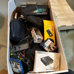 Assorted Chargers, Battery Pack, Brand New Bluetooth Speaker, And More (Basement Shelf)