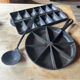 Three Pieces Of Cast Iron Including Corn Bread Skillet (Kitchen)