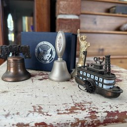 Clinton Presidential Bell, Liberty Bell, Statue Of Liberty Bell, And Boat Pencil Sharpener (LR)