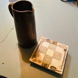 Tall Pottery Barn Brown Pitcher And Ceramic Fishing-Themed Trivet (Basement Back)