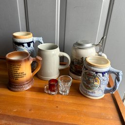 Five Vintage Steins And Two Shot Glasses