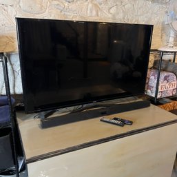 Samsung 48' Television With Sound Bar (basement)