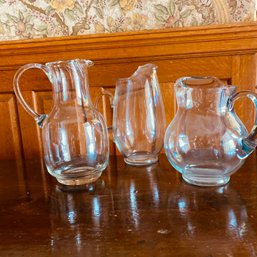 Trio Of Elegant Glass Pitchers  (front Door Entry)