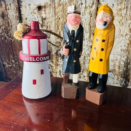 Pair Of Carved Nautical Figures And Decorative Lighthouse (barn)