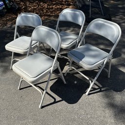 Set Of Four Metal Folding Chairs With Cushioned Seats (MC)