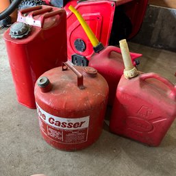 Four Metal & Plastic Gas Cans (Garage)