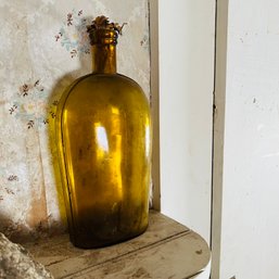 Amber Glass Bottle (Upstairs, Left)