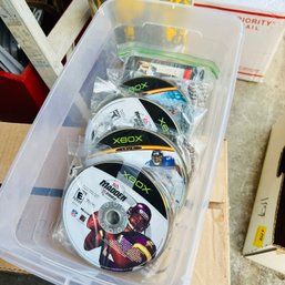Assorted Xbox Game Discs And Sega Genesis Game