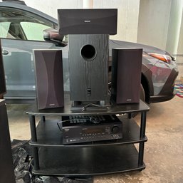 Stacked Lot Of Onkyo Speaker System, Reciever And Entertainment Center, (garage)