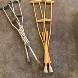 1 Set Of Aluminum Adjustable Crutches  1 Set Of Wooden Crutches (Bsmt)