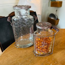 Pair Of Decorative Glass Jars With Metal Holders