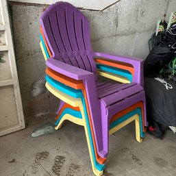 Four Colorful Plastic Adirondack Chairs (Garage)