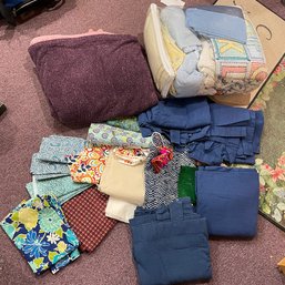 Assorted Linens Including Curtains, Fabric Scraps, And ViRRRntage Baby Blankets (Basement)