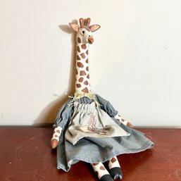 Giraffe Doll Wearing Dress With Apron
