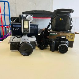 Camera Lot: Panasonic Lumix DMC-FZ70, Canon FTb, Fujifilm And Panasonic Lumix Z519