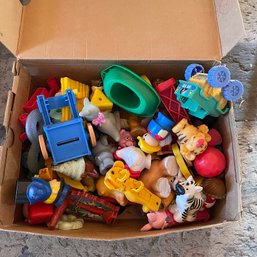 Box Full Of Vintage Toys Including Pez, Fisher Price, And Disney (Zone 3)