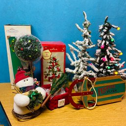 Festive Flyer Sled, Snowman, Frosted Fir, Lit Up Mifford Tree, Hallmark Tree, Sugar Plum Topiary (basement)