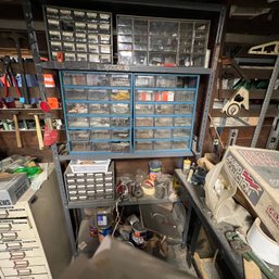 Metal Shelf Filled With Hardware (basement)