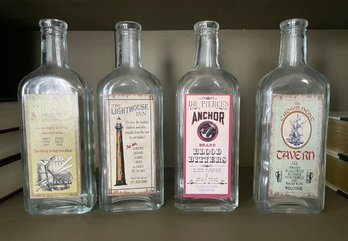 Four Decorative Faux Advertising Bottles (GR)