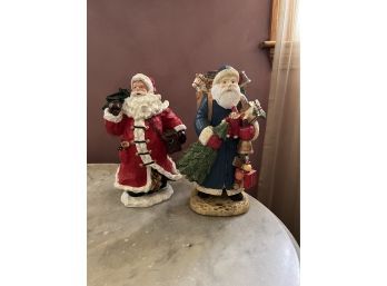 Pair Of Resin Santa Figures (Living Room)