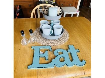 Kitchen Table Lot: Eat Sign, Two Tier Stand With Mugs And Cruets (Room 6)