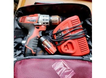 Milwaukee Drill With Charger  In Red Case (Bedroom)