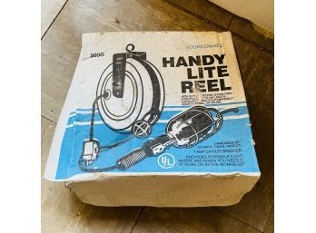 Handy Lite Reel - Like New! (Porch)