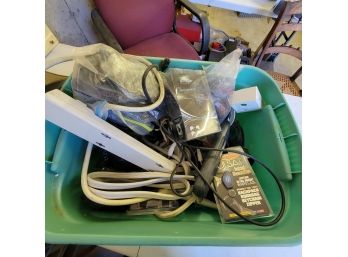 Electronics Lot. Remote Controls, Misc Plugs And Adapters. Power Strips. Green Tote. (Zone 1)