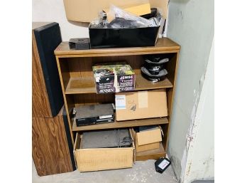 Bookshelf With Assorted Audio Parts And Components (Garage)