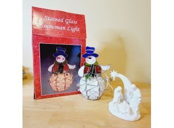 Stained Glass Snowman And Ceramic Creche