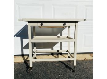 Vintage Refinished Wooden Serving Cart With Metal Wheels And Drawer