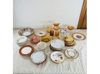 Assortment Of Vintage Dishes And Yellow And Gold Hues