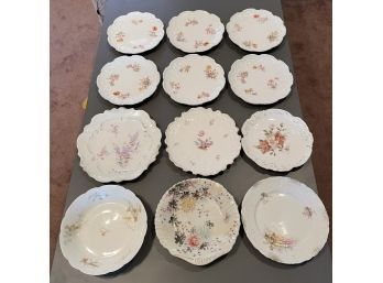 Twelve White And Floral Plates Including Six Matching Carlsbad Austria