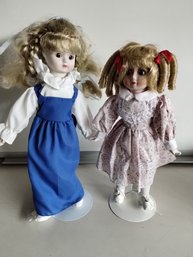 Two Vintage Dolls On Stands