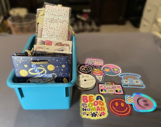 ASSORTED COLLECTION OF STICKERS, GIFT BAGS, AND DECORATIVE TISSUE PAPER