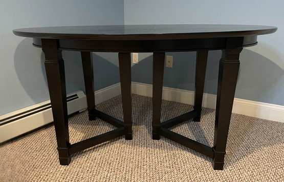 BLACK OVAL DINING TABLE WITH DOUBLE TRESTLE BASE