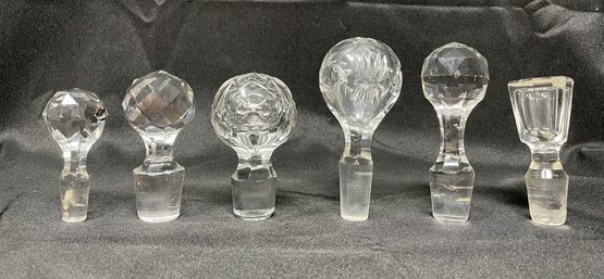ASSORTED COLLECTION OF CRYSTAL DECANTER STOPPERS