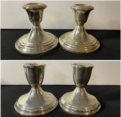 TWO PAIRS OF STERLING SILVER CANDLE HOLDERS BY GORHAM AND DUCHIN CREATION